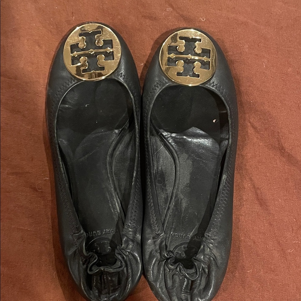 Tory Burch Black Flats with Gold Emblem